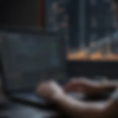 A close-up of a person analyzing data on a laptop